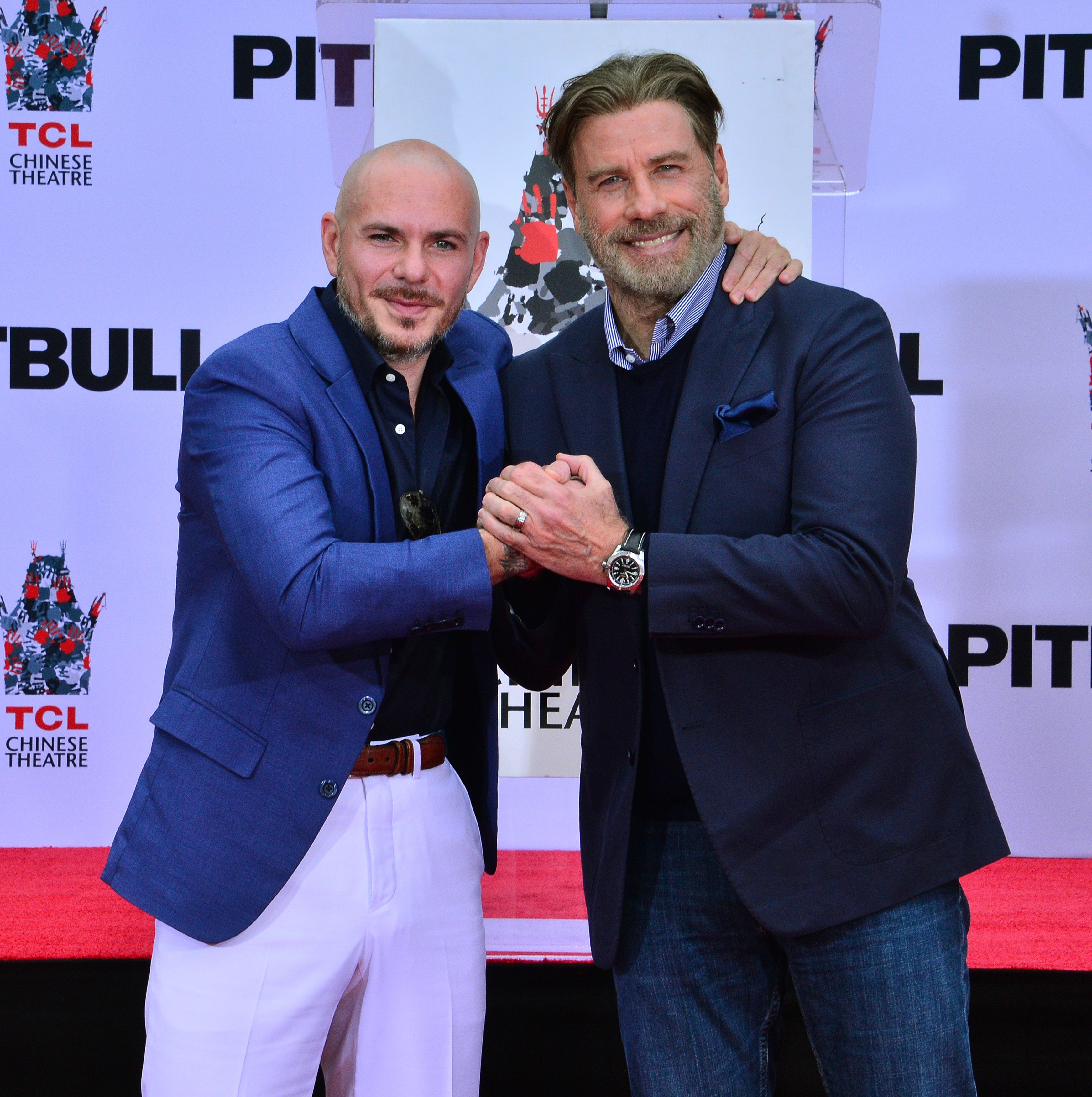 John Travolta and Pitbull