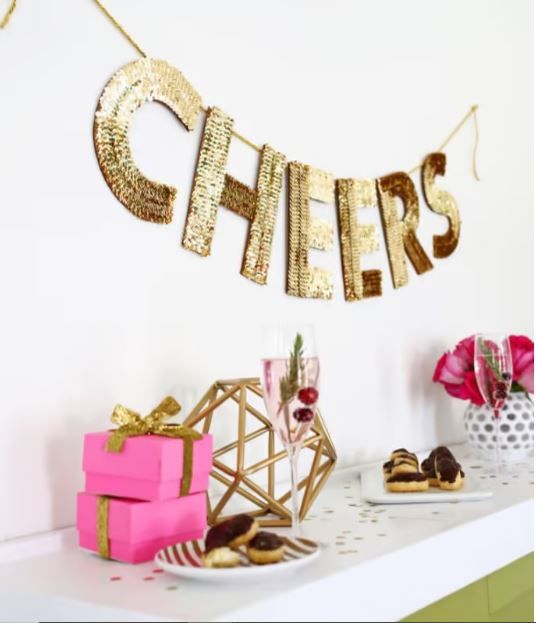 Add a glamorous touch to your party with this sequin letter garland