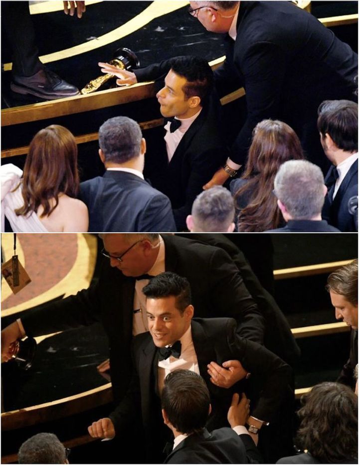 Rami Malek falls off stage