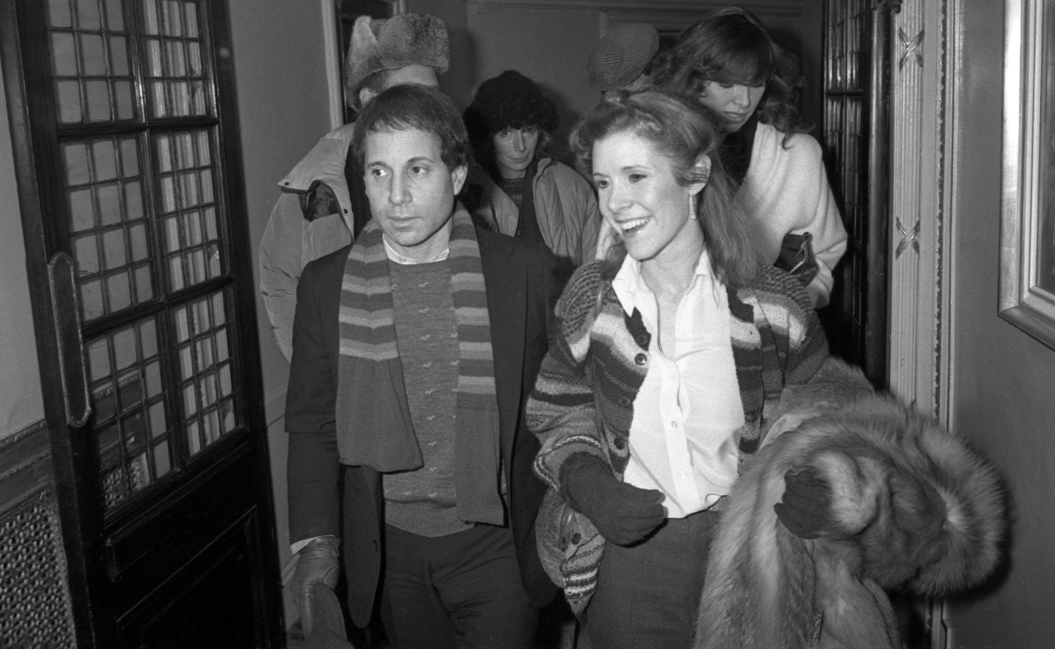 Carrie Fisher and Paul Simon (1983)